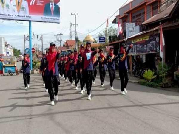 IKUT MEMERIAHKAN HUT RI KE 77 TAHUN 2022, DEWAN GURU SMK MUHAMMADIYAH PAGARALAM MENGIKUTI LOMBA BARIS BERBARIS.